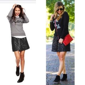 Shiny black leopard skirt